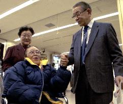 A-bomb survivor reunites with relatives